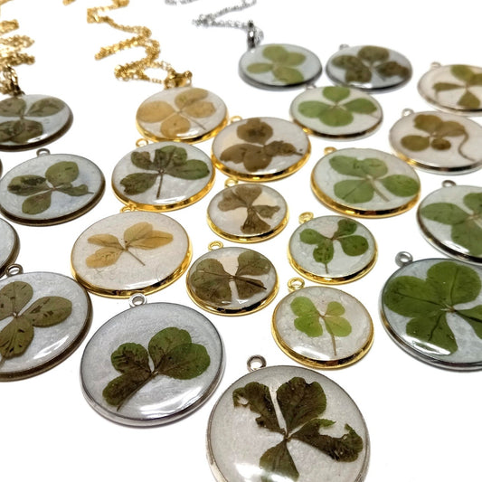 Pendants with a real four leaf clover. Each one is different, each one a work of nature.